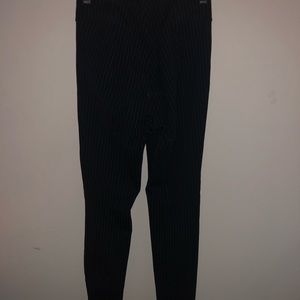 H&M Form fitting pinstripe slacks.